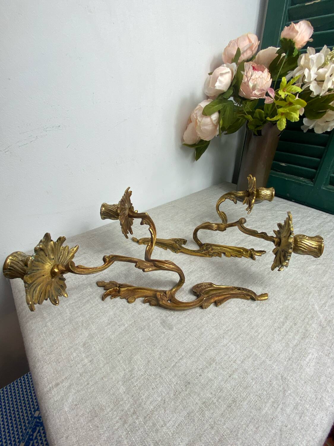 Two Louis XV style bronze wall candlesticks