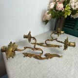 Two Louis XV style bronze wall candlesticks