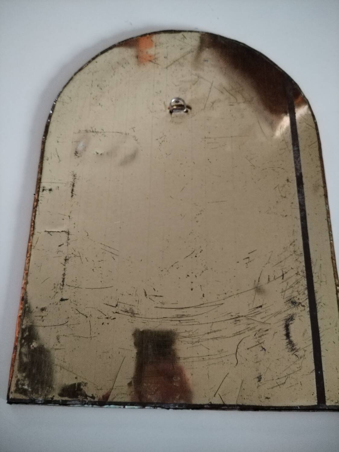 Old brass half moon mirror