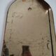 Old brass half moon mirror