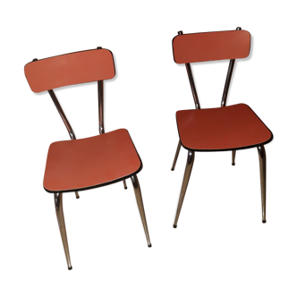 Pair of chairs in vintage pastel red formica