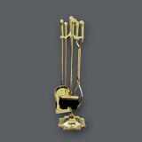 Antique fireplace tool in gilded zamak with duck head designs.