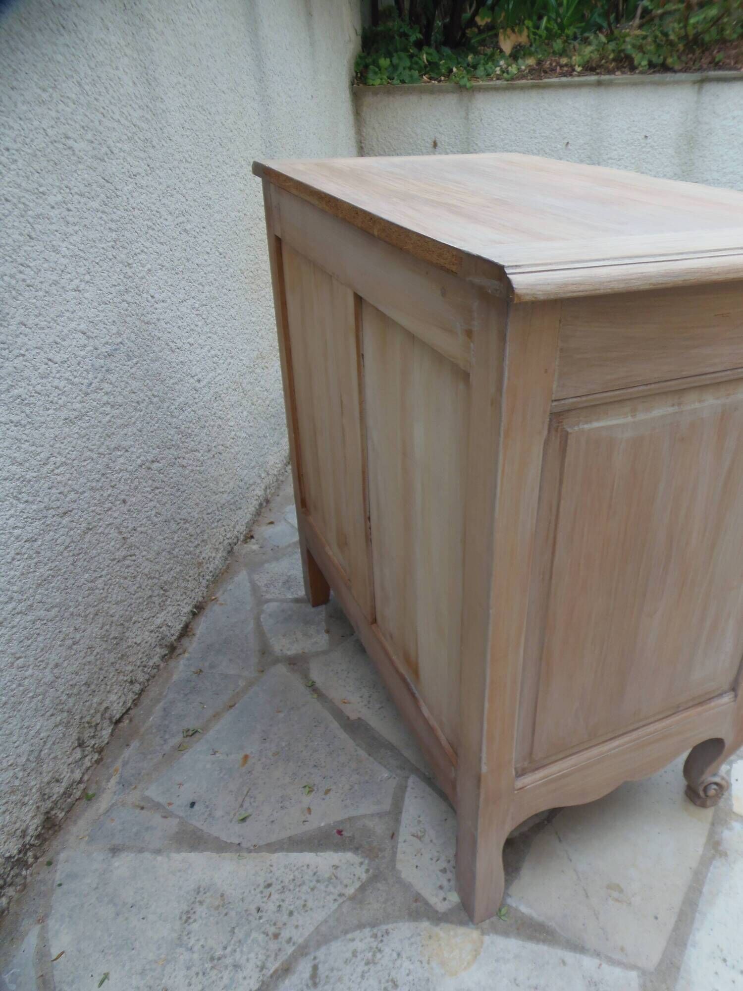 Beautifully crafted Louis XVI style commode in bleached wood.