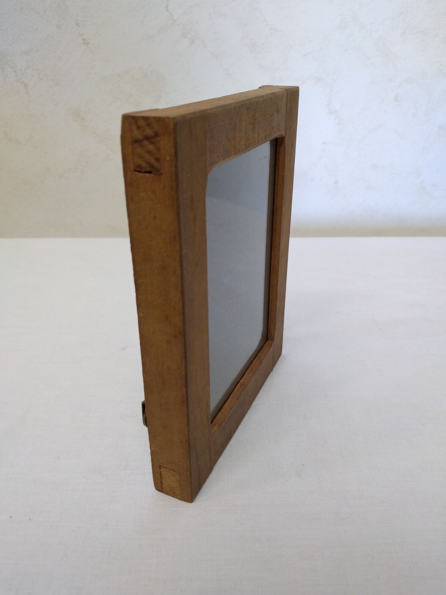 Photo frame in wood and glass