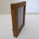 Photo frame in wood and glass