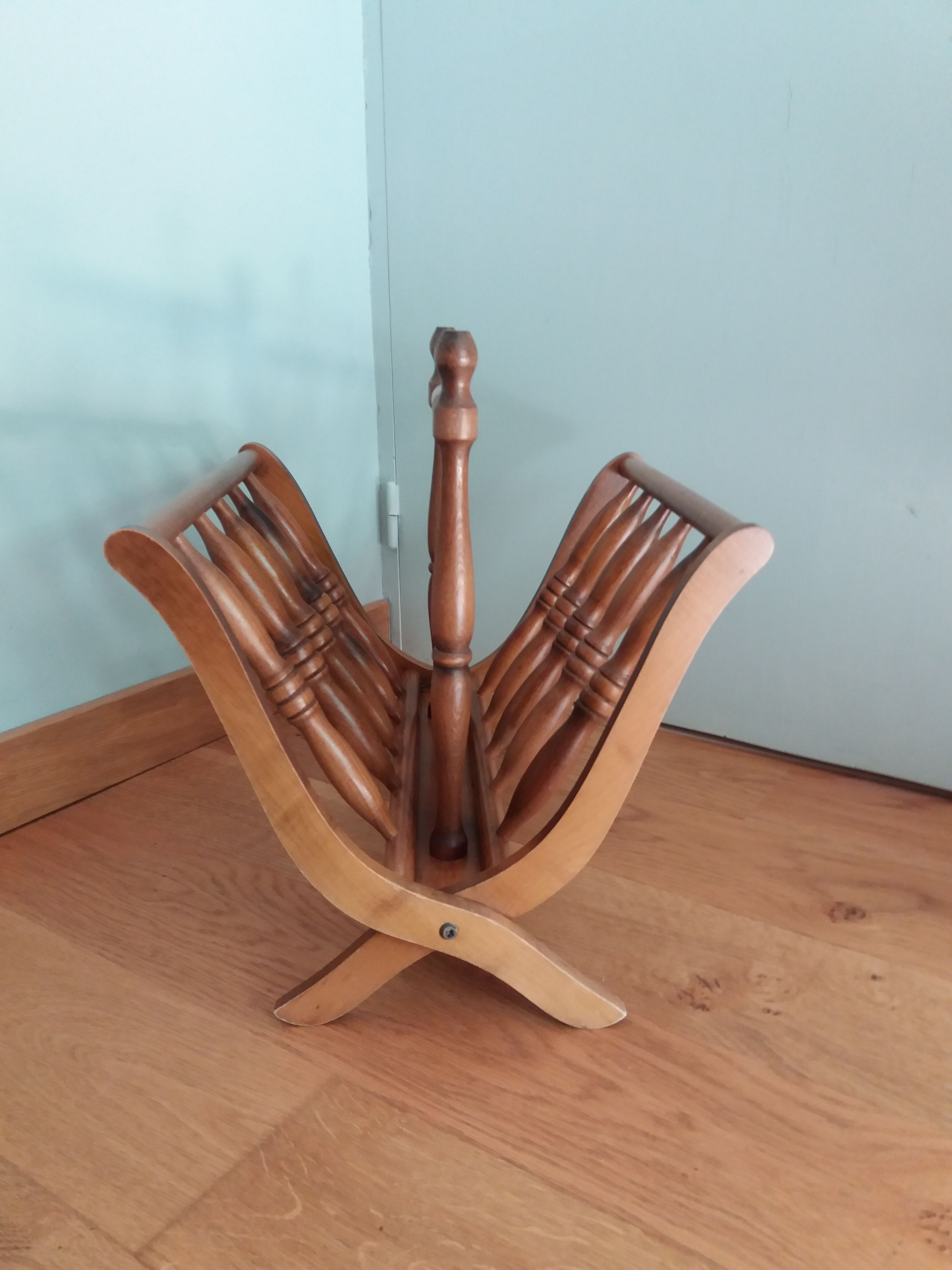 Turned wooden magazine holder