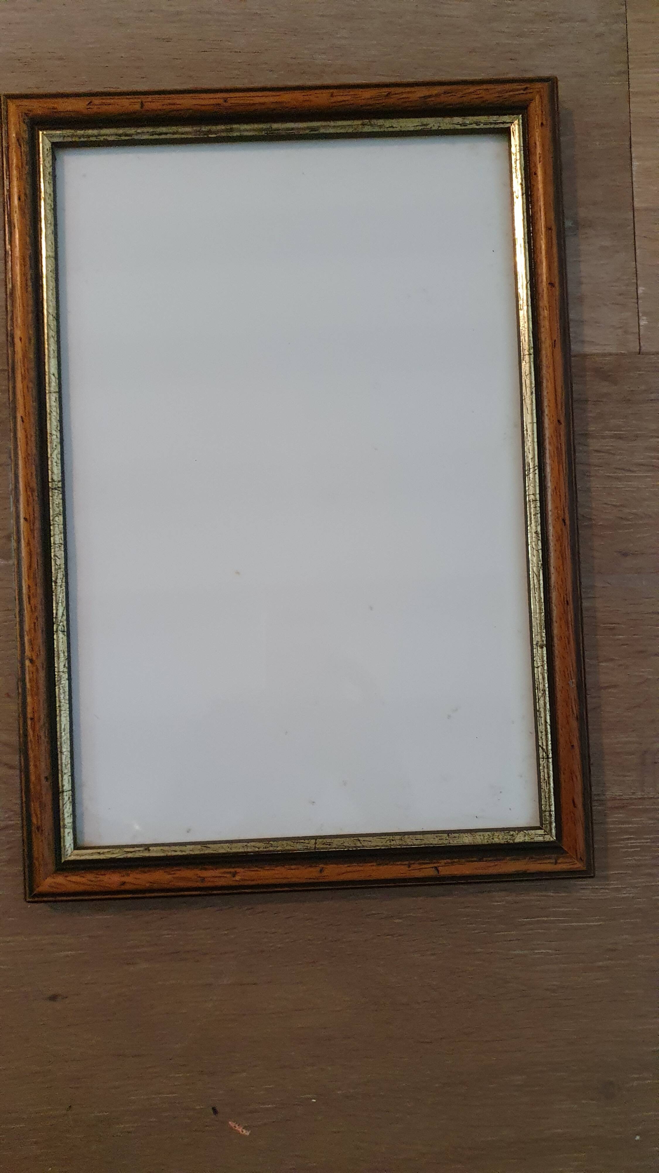 Set of 2 wooden frames with gilded edging