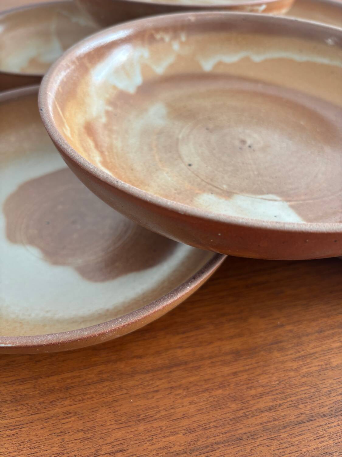 Lot of vintage 1970s stoneware deep plates - handmade beige ceramics.