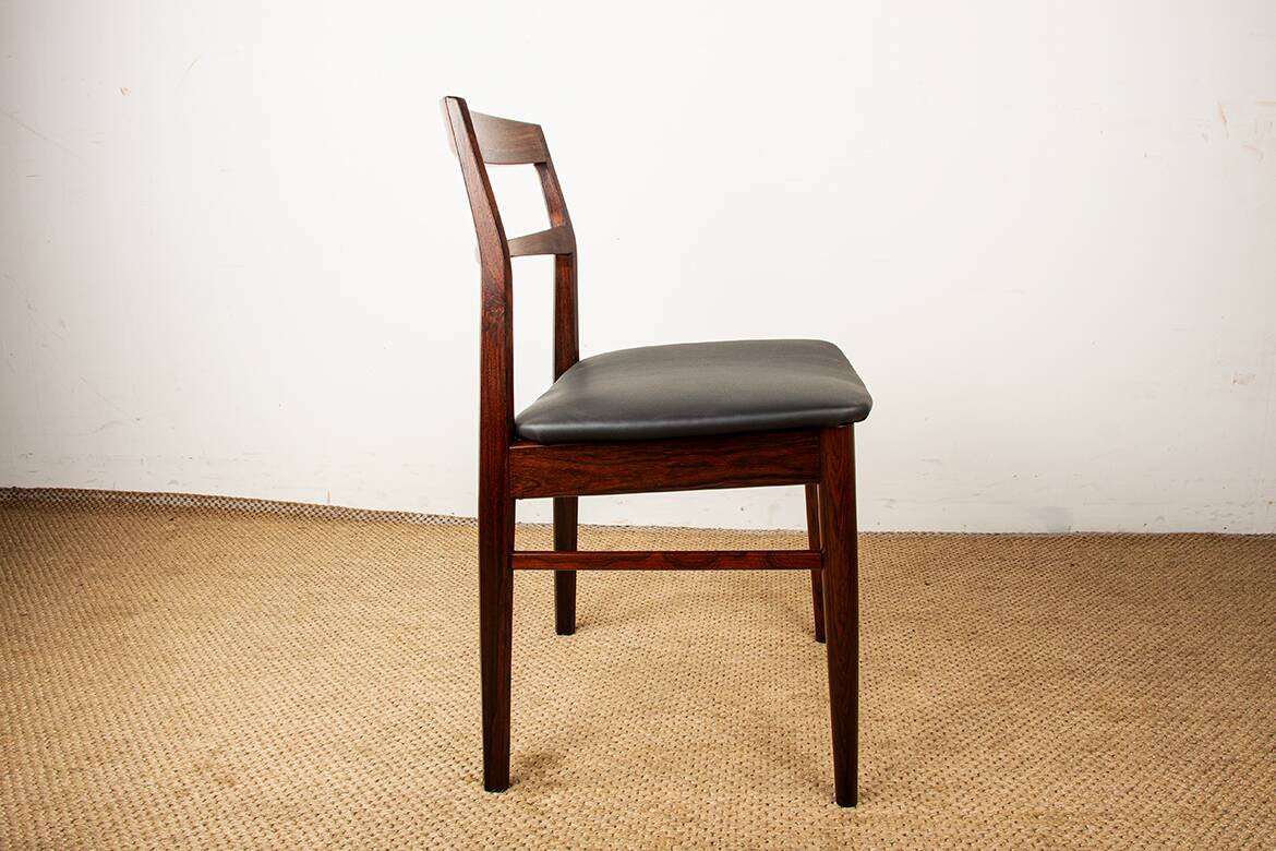 4 Danish chairs in rosewood and new leatherette by Henning Kjaernulf 1960.