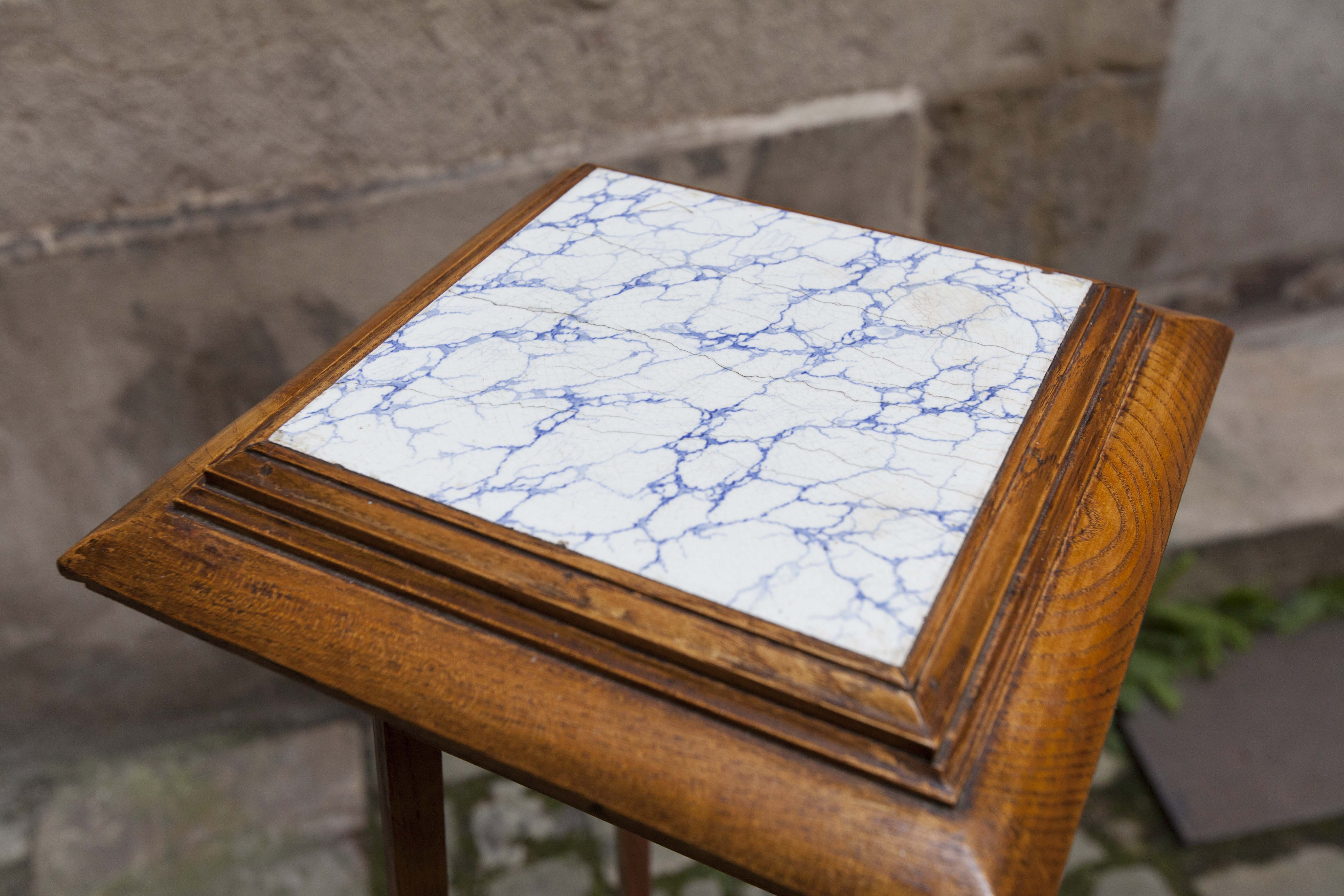 Wooden and ceramic sellette, 1920