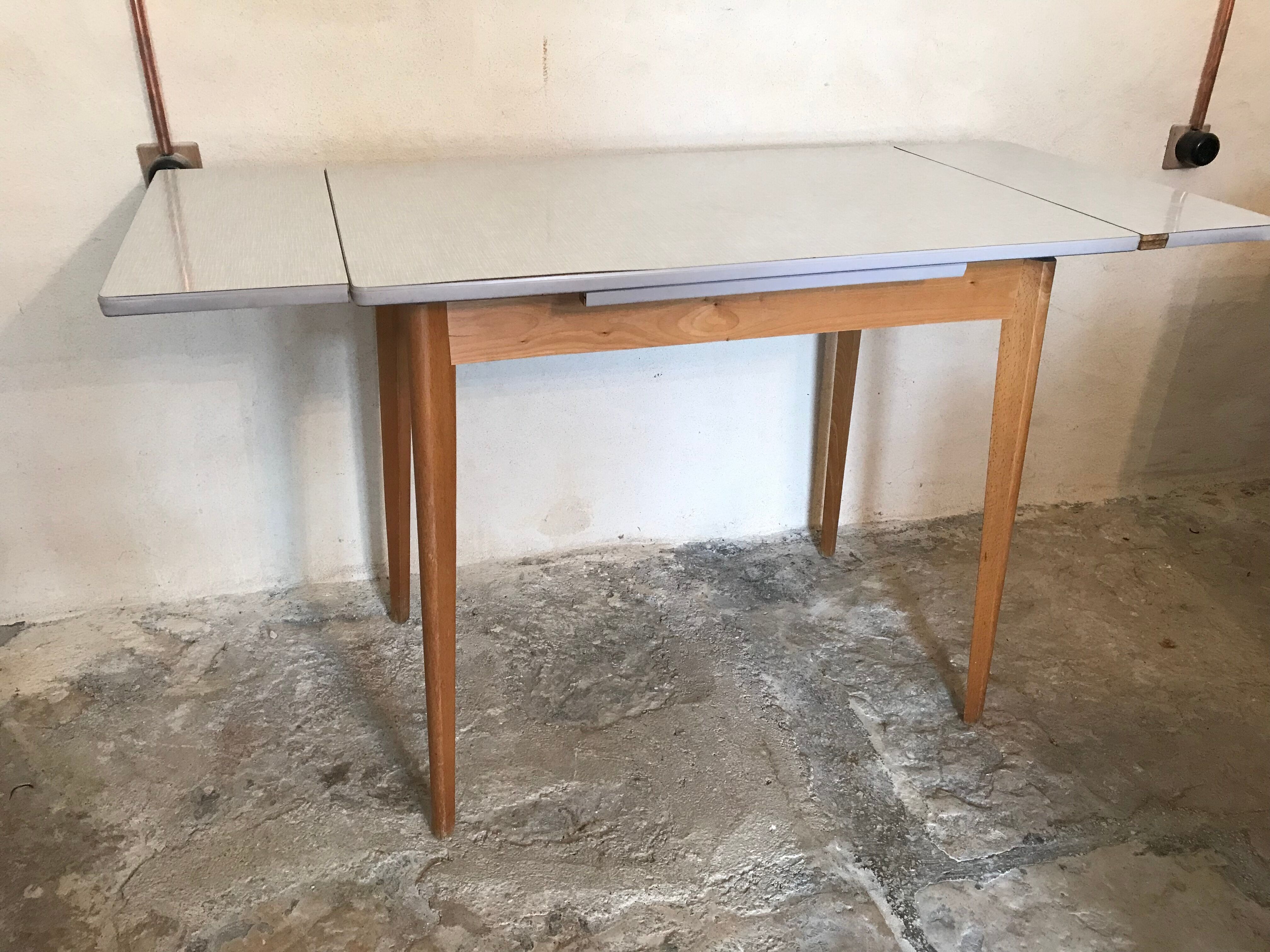 Vintage table 1960's wood and formica with extensions and wooden legs