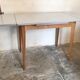 Vintage table 1960's wood and formica with extensions and wooden legs