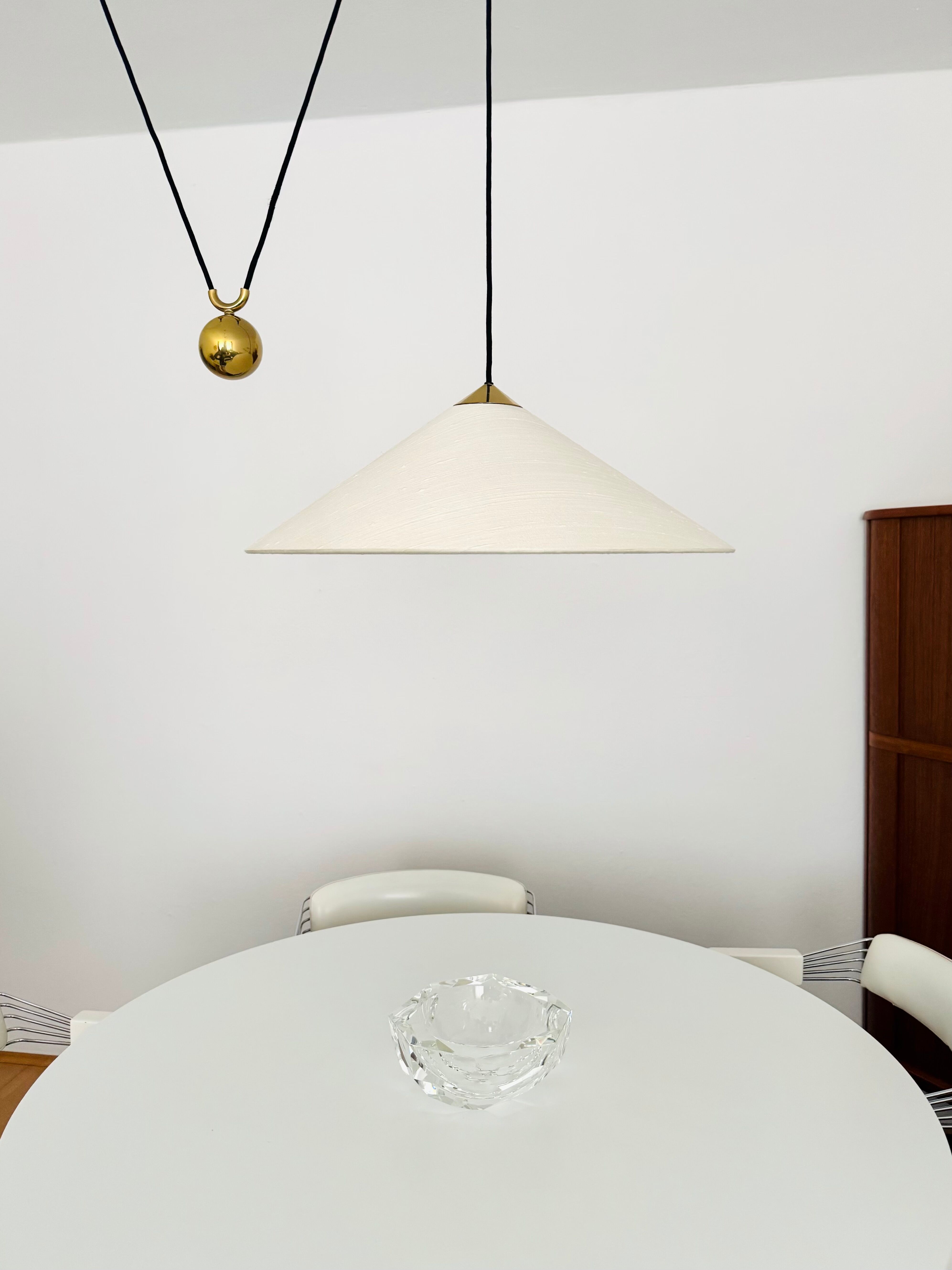 Large Adjustable Brass Pendant Lamp with Counterweight by Florian Schulz