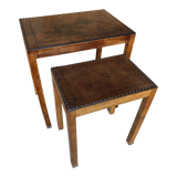Pair of studded nesting tables and 1930