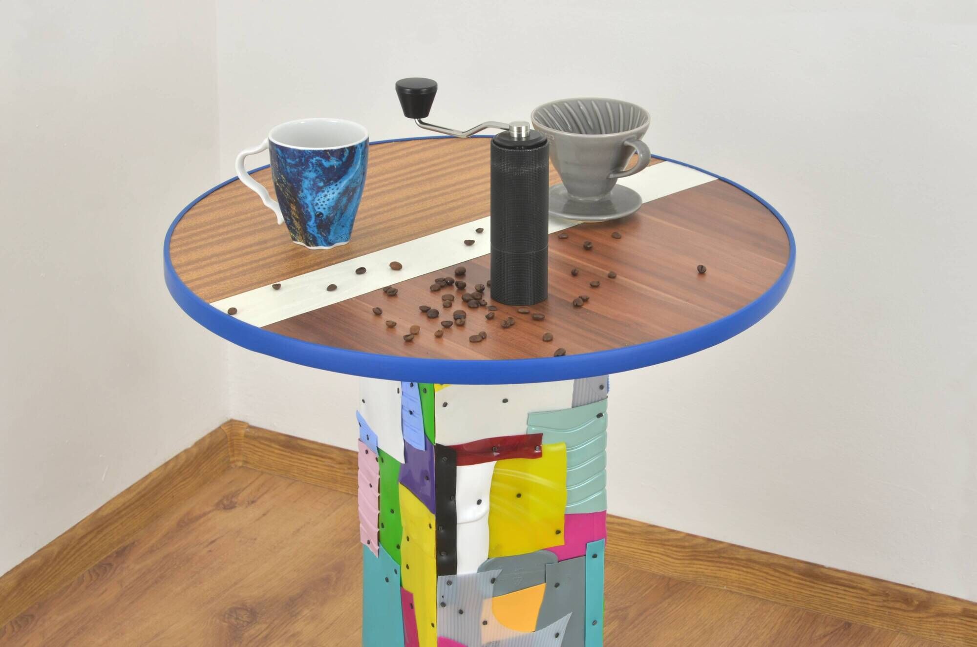 Handmade table made from recycled materials, colourful, abstract.