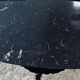 Table basse pied tulipe en marbre noir