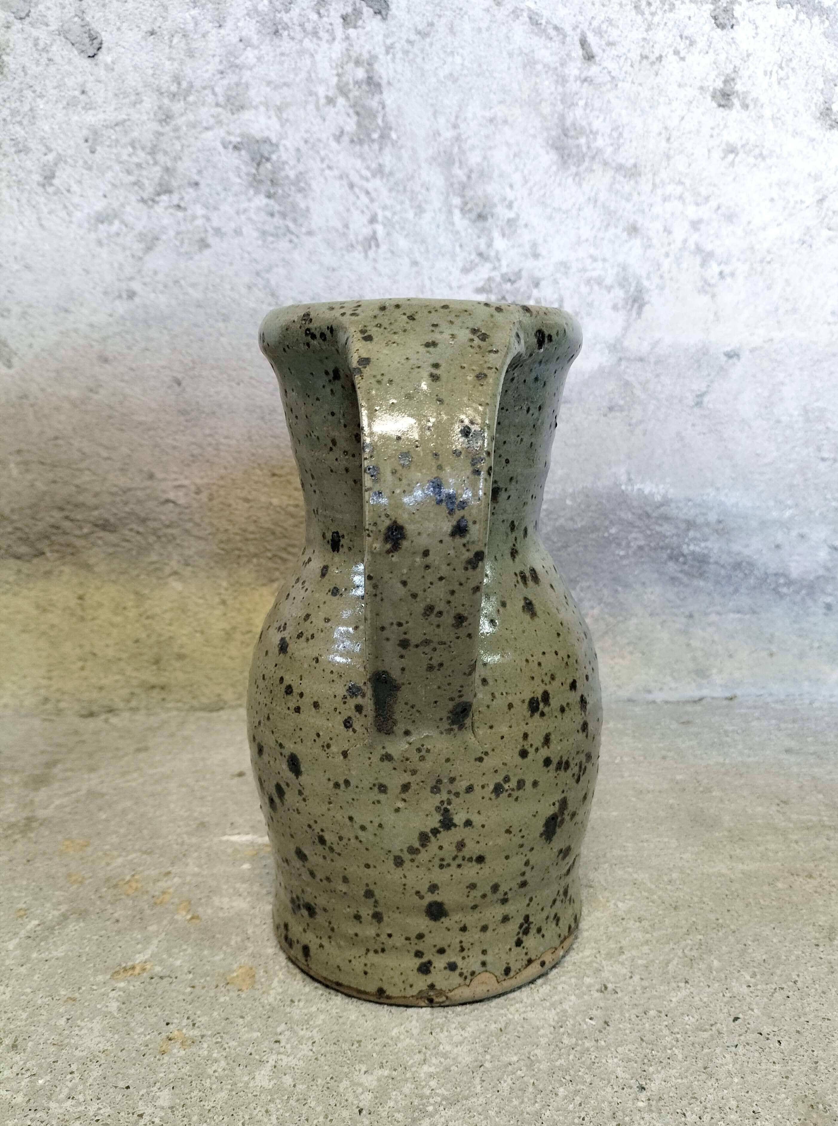 Stoneware pitcher by Gustave Tiffoche