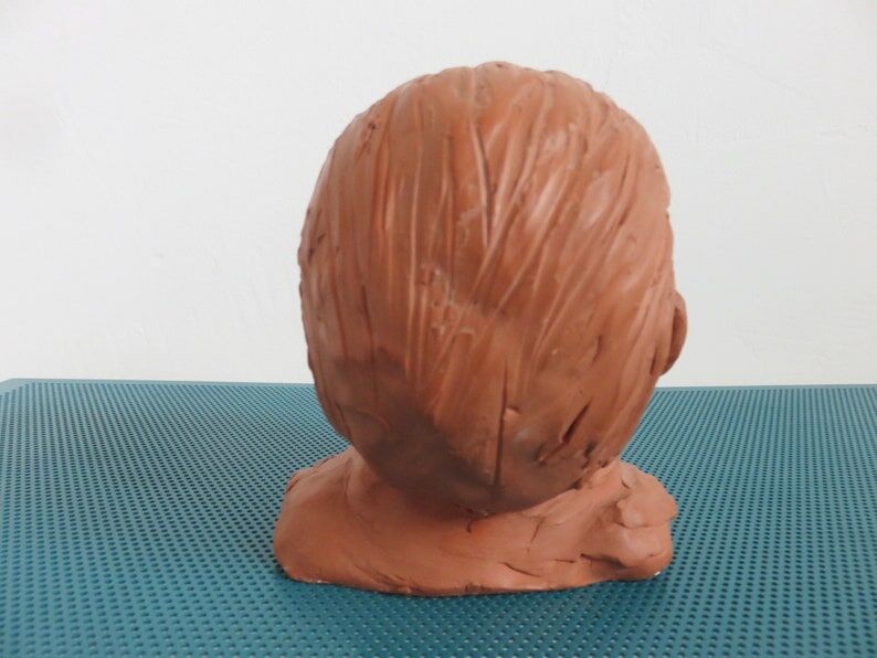 Ancient terracotta bust statue