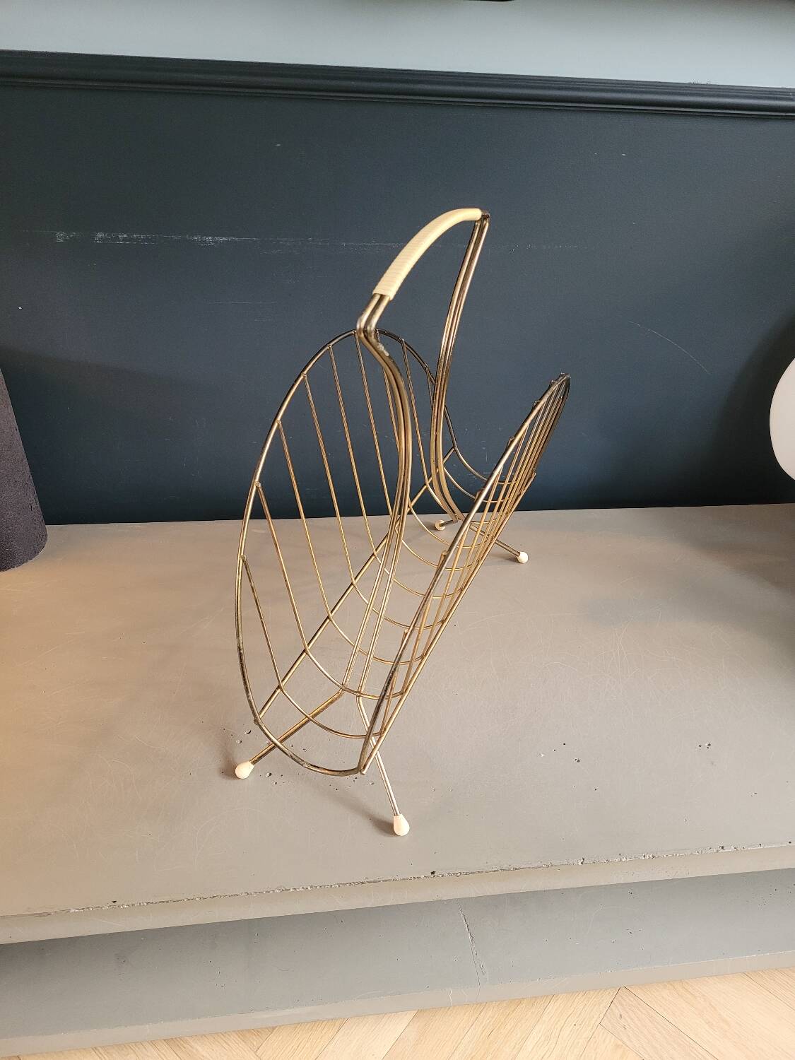 Vintage gold metal magazine rack