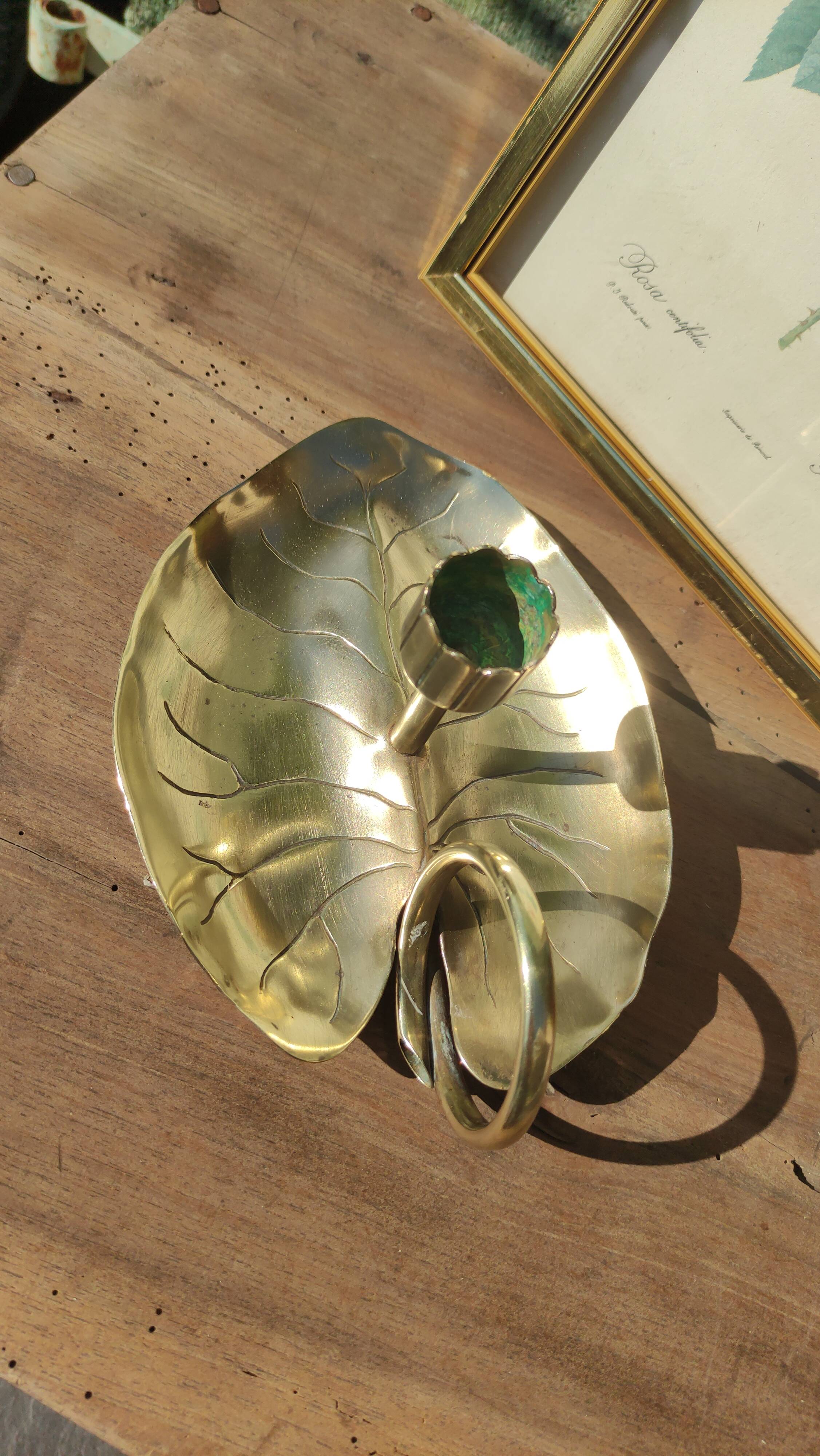 Vintage candle holder in golden brass