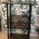 Service, TV stand on wheels in smoked glass Erard