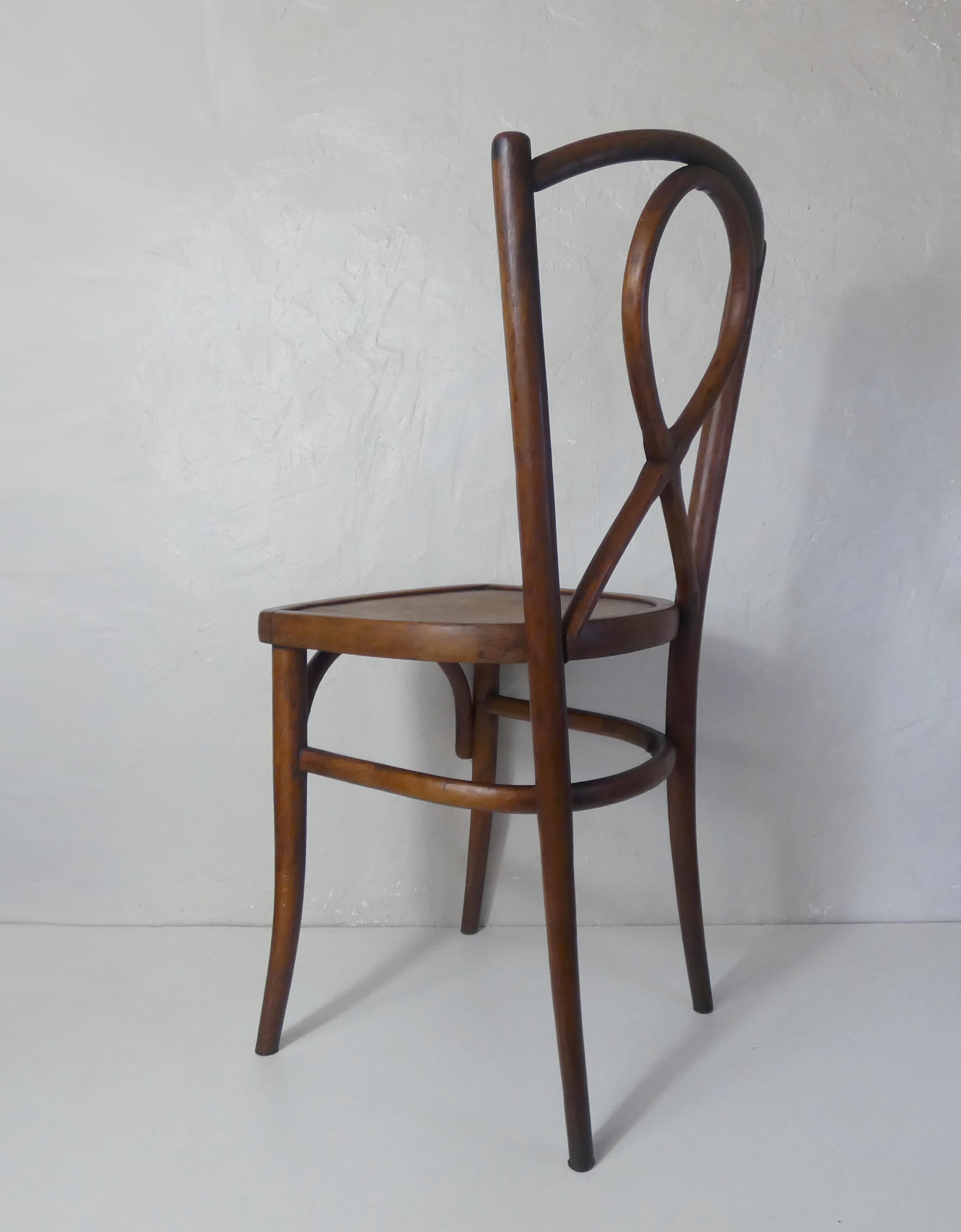 Old curved wooden bistro chair