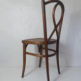 Old curved wooden bistro chair