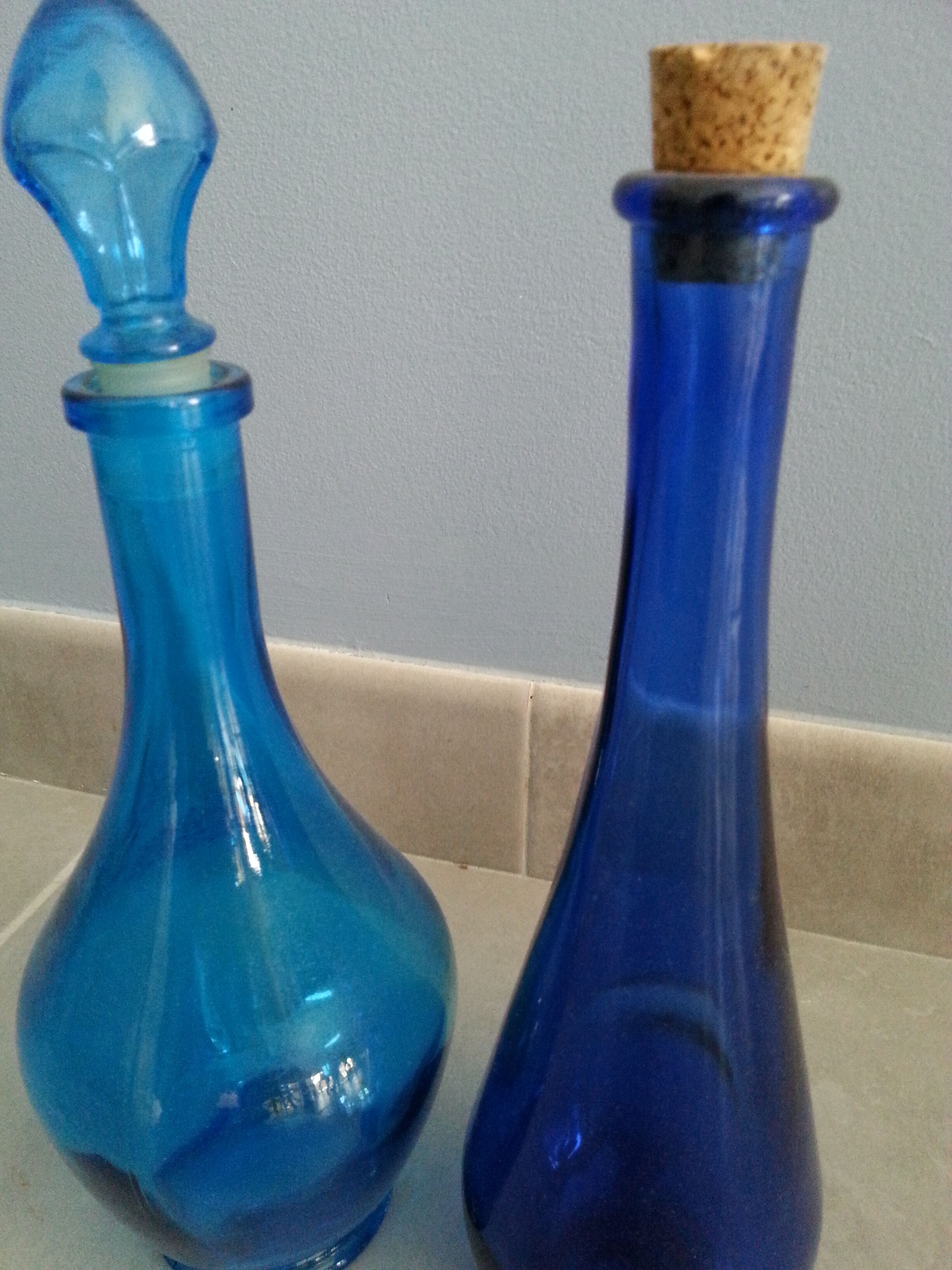 Lot 2 blue glass bottles