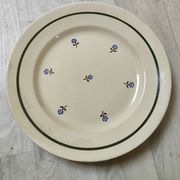 Flat round earthenware dish