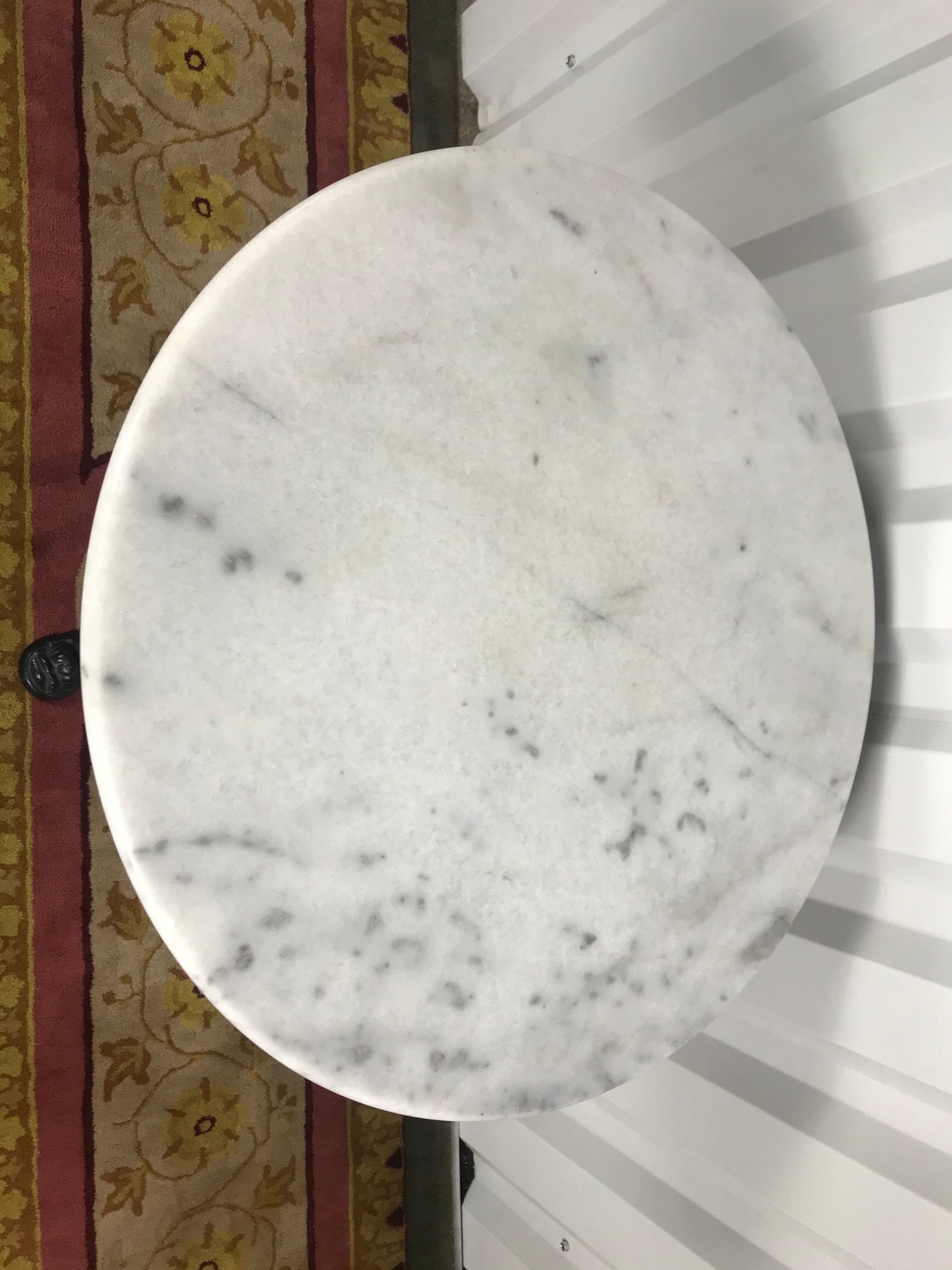 Marble bistro round table and cast foot