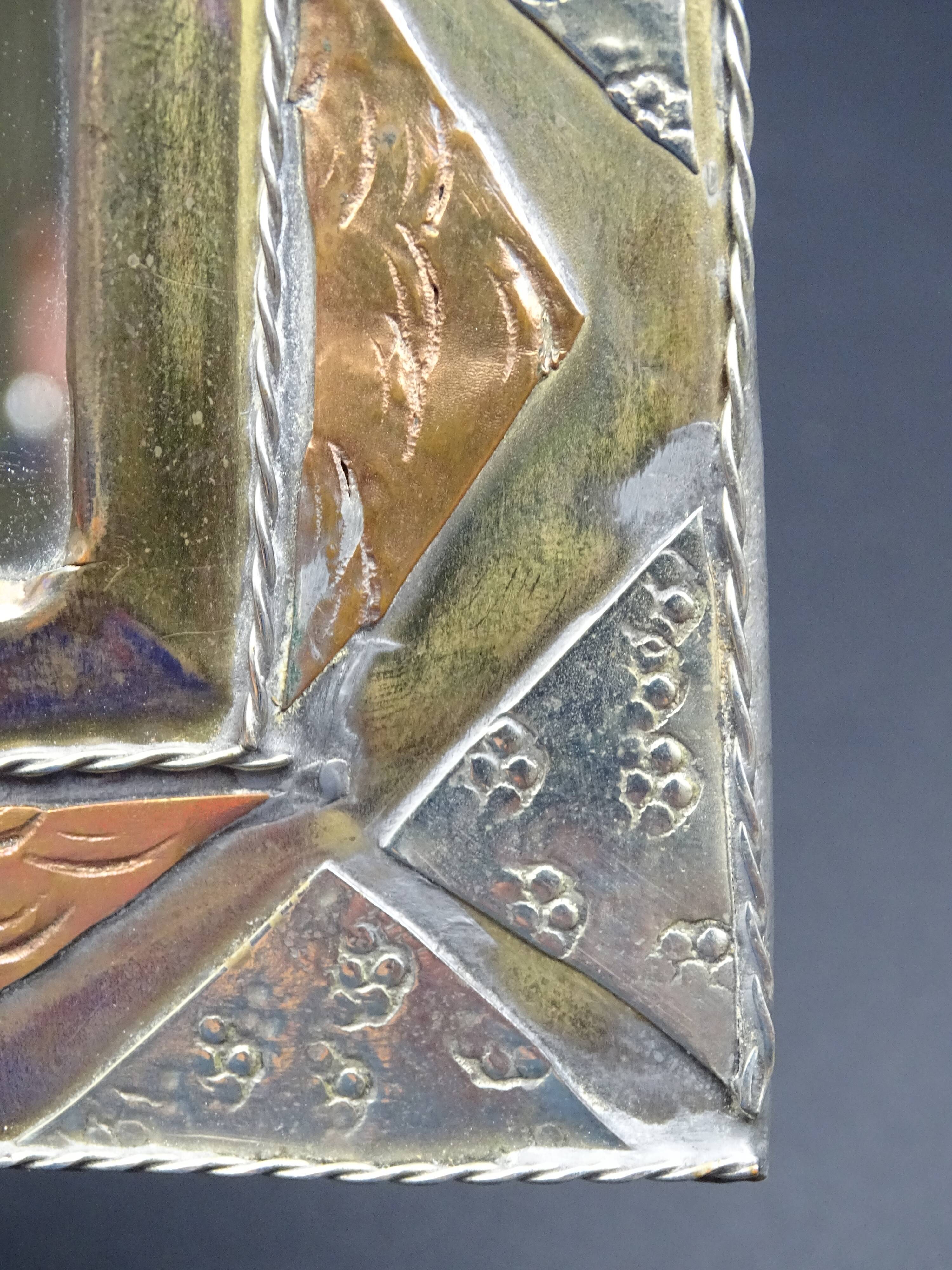 Oriental mirror in worked copper 24x15cm