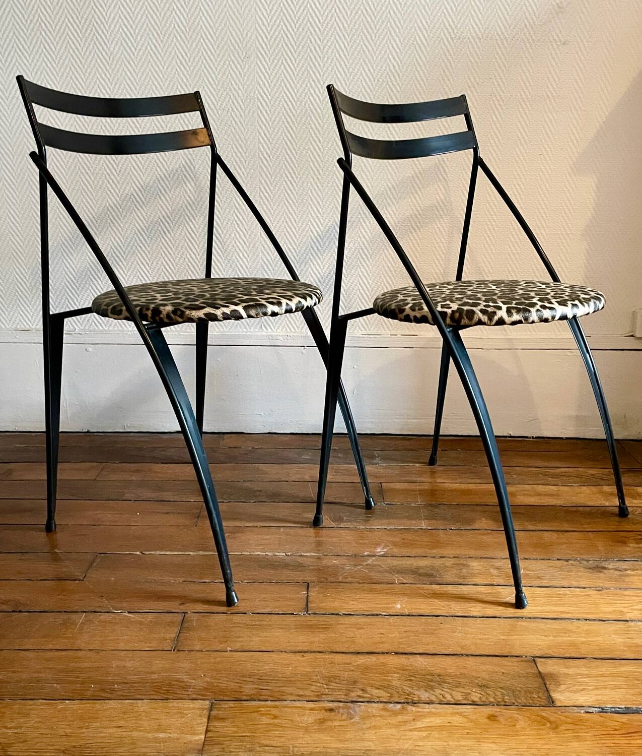 Pair of folding chairs with leopard seats, 1980