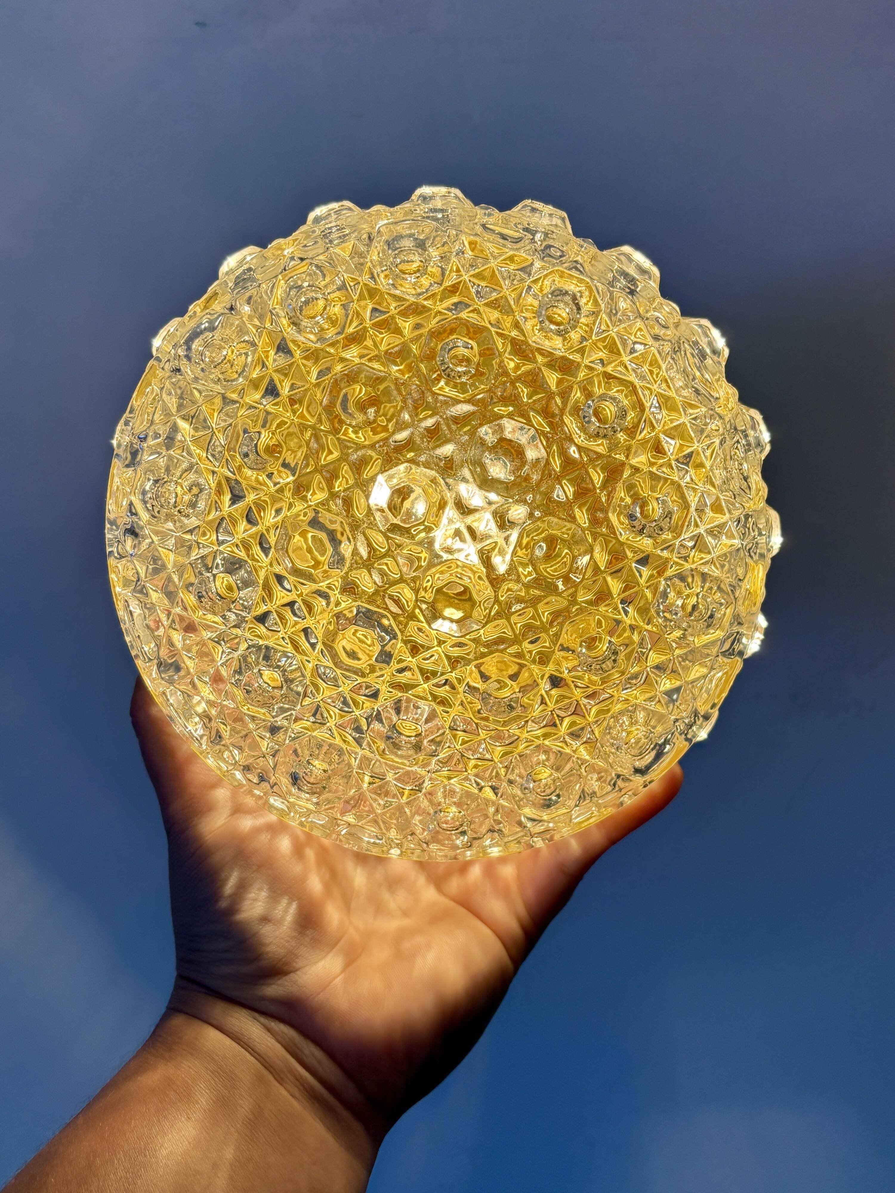 Vintage glass moulded globe wall/ceiling light.