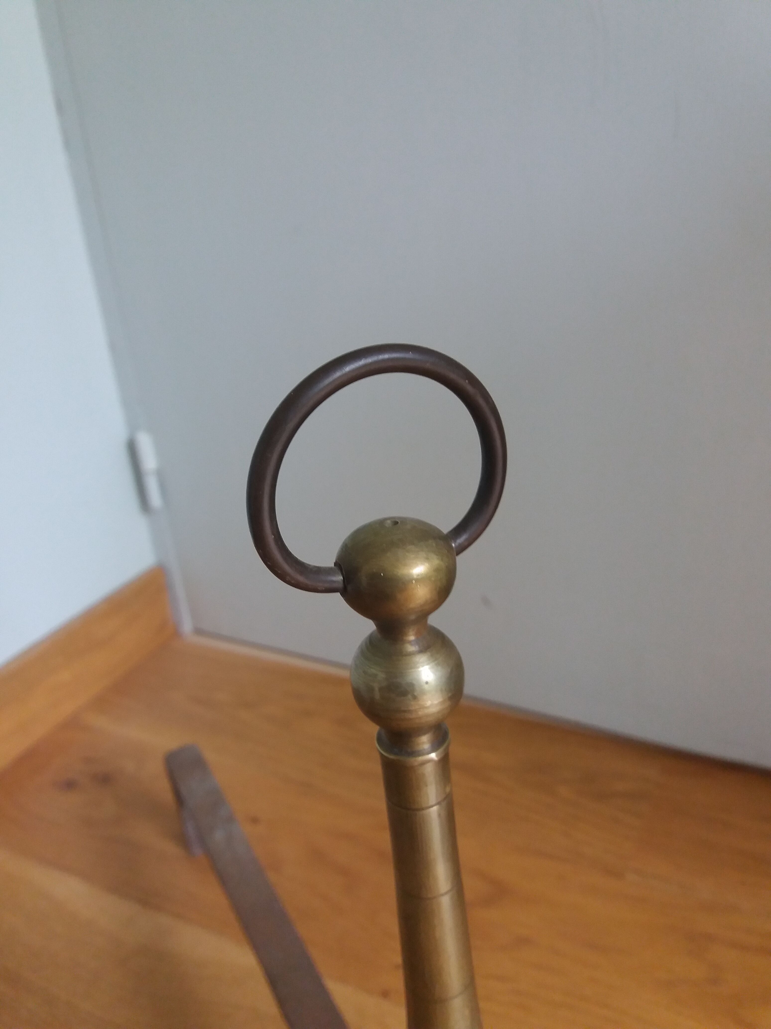 Brass or bronze andirons