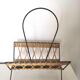 Vintage wicker and steel magazine door design 60s