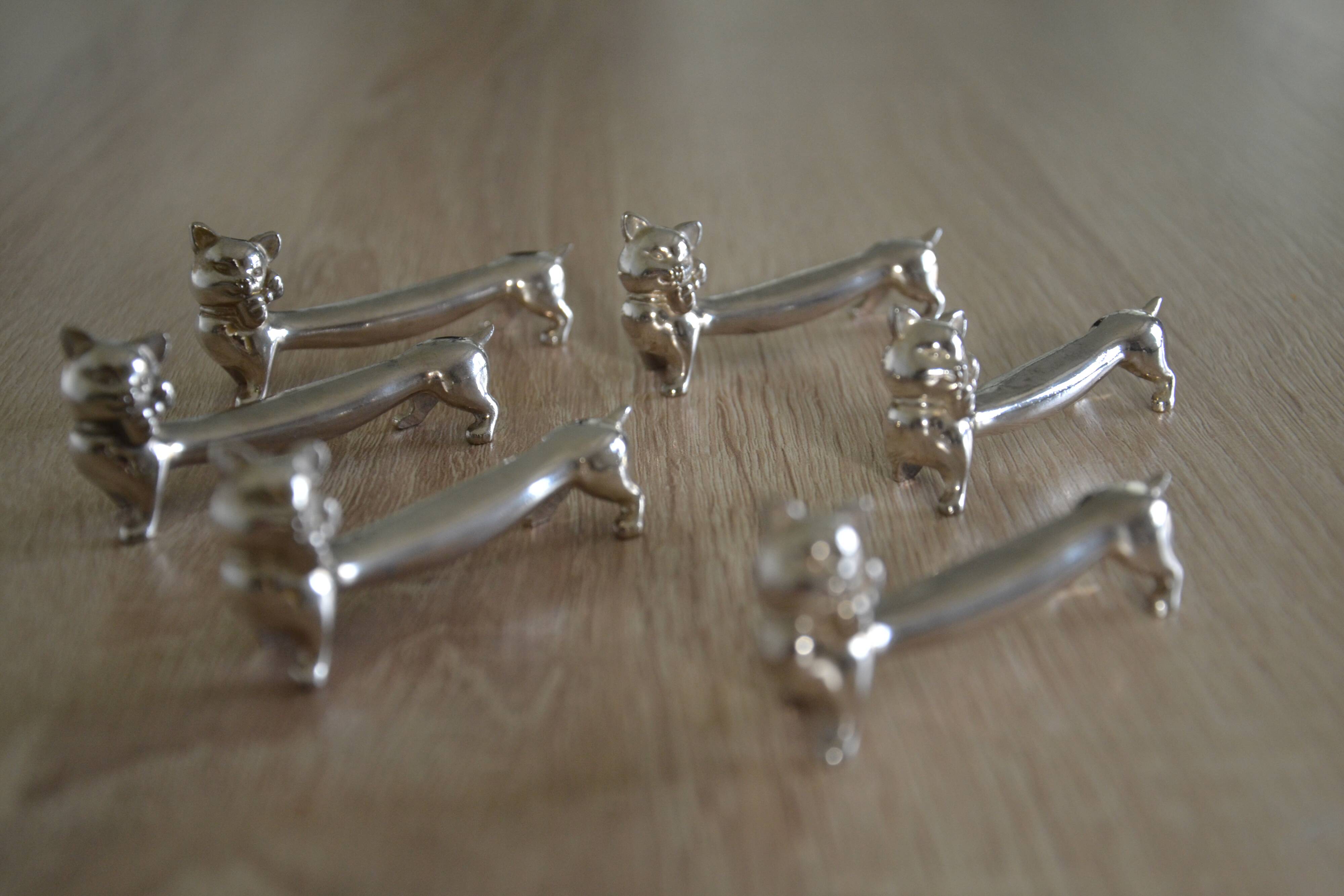 6 silver-plated cat knife rests
