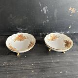 Pair of tripod bowls in gilded Limoges porcelain.