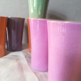 8 coloured cups in earthenware