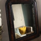 Antique Louis Philippe mirror in black and brown.