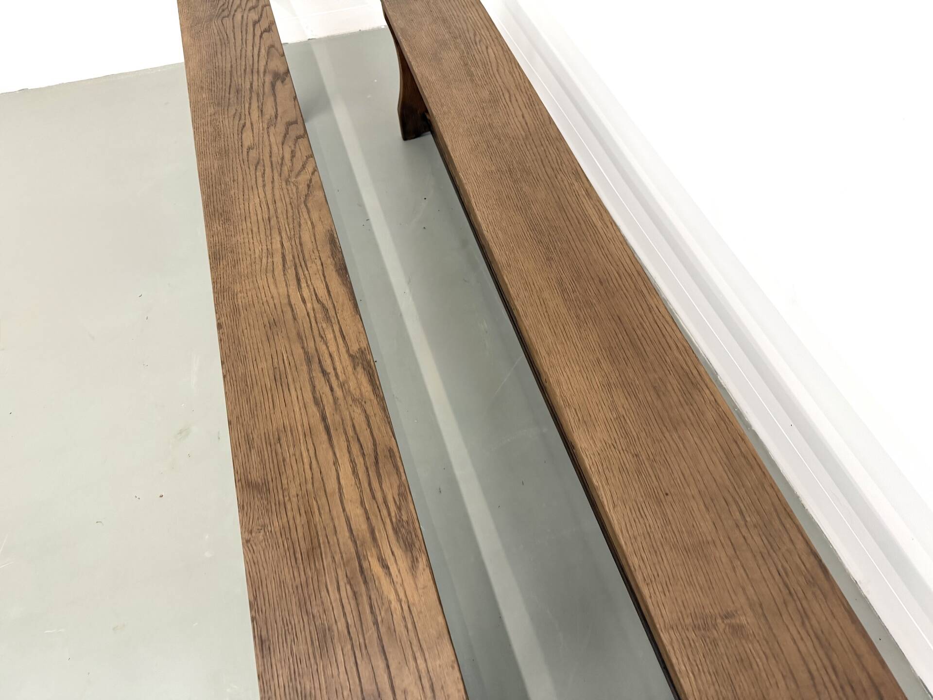 Pair of solid oak benches, winged legs, France, 1970s