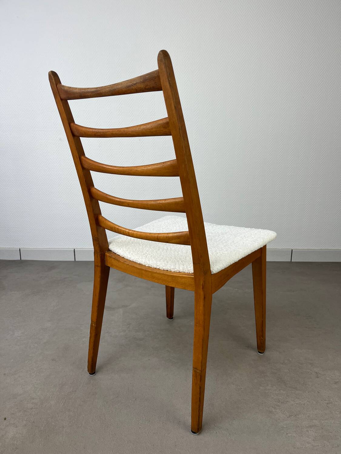 4 Scandinavian chairs, teak with boucle seats.