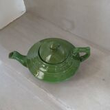Green earthenware teapot