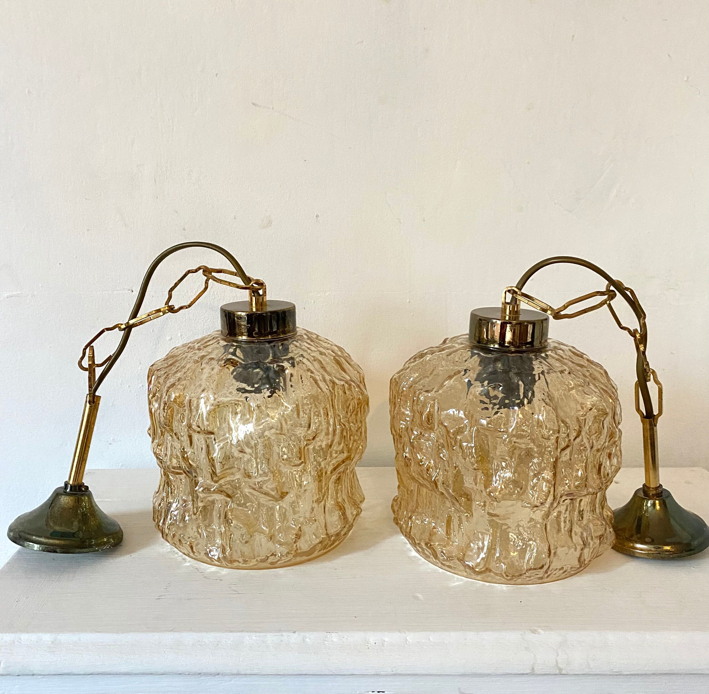 Pair of vintage amber glass pendant lamps