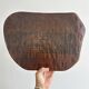 Tabouret tripode ancien en bois foncé sculpté