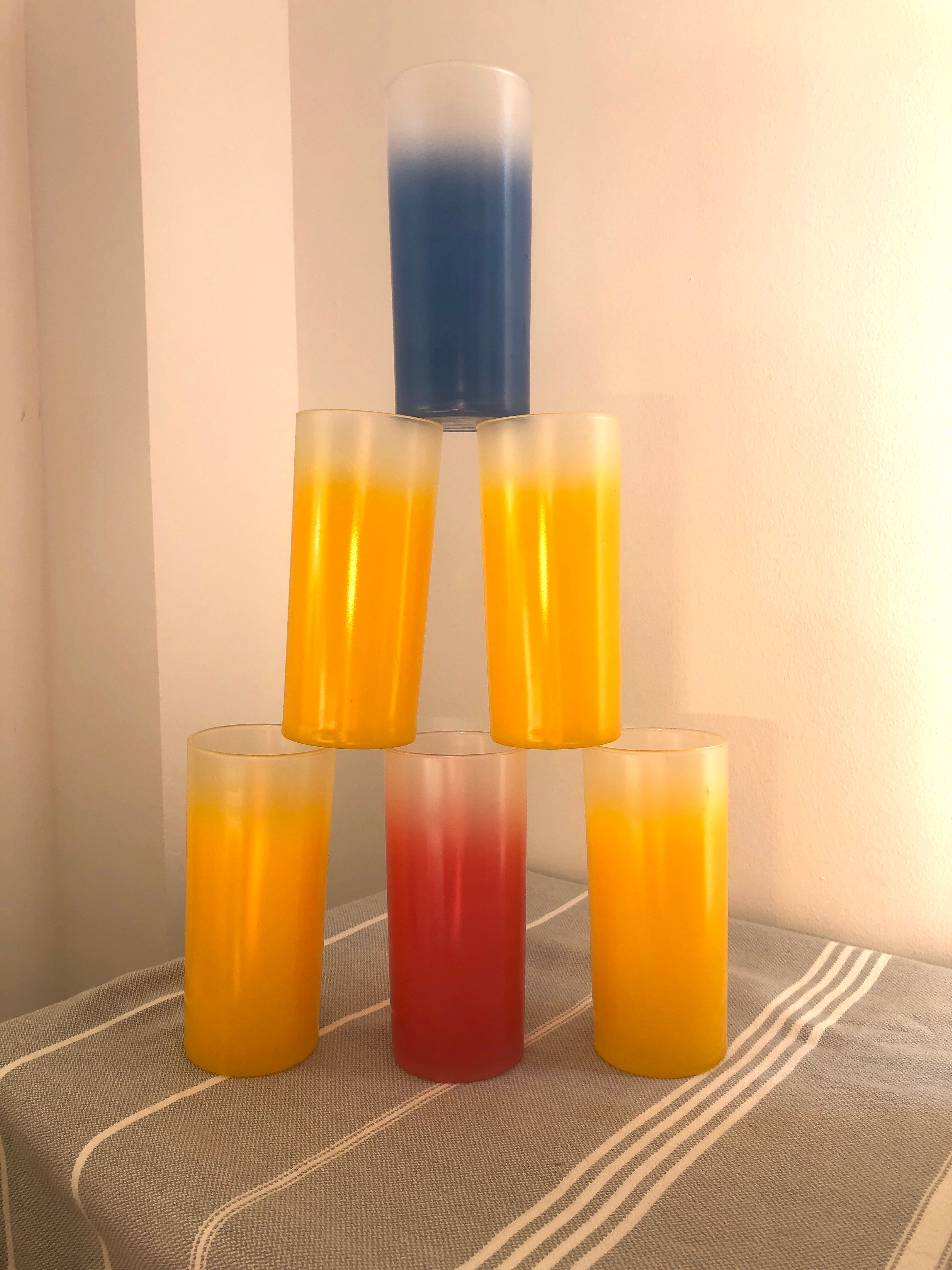 Yellow, red and frosted yellow orangeade glasses made of vintage glass