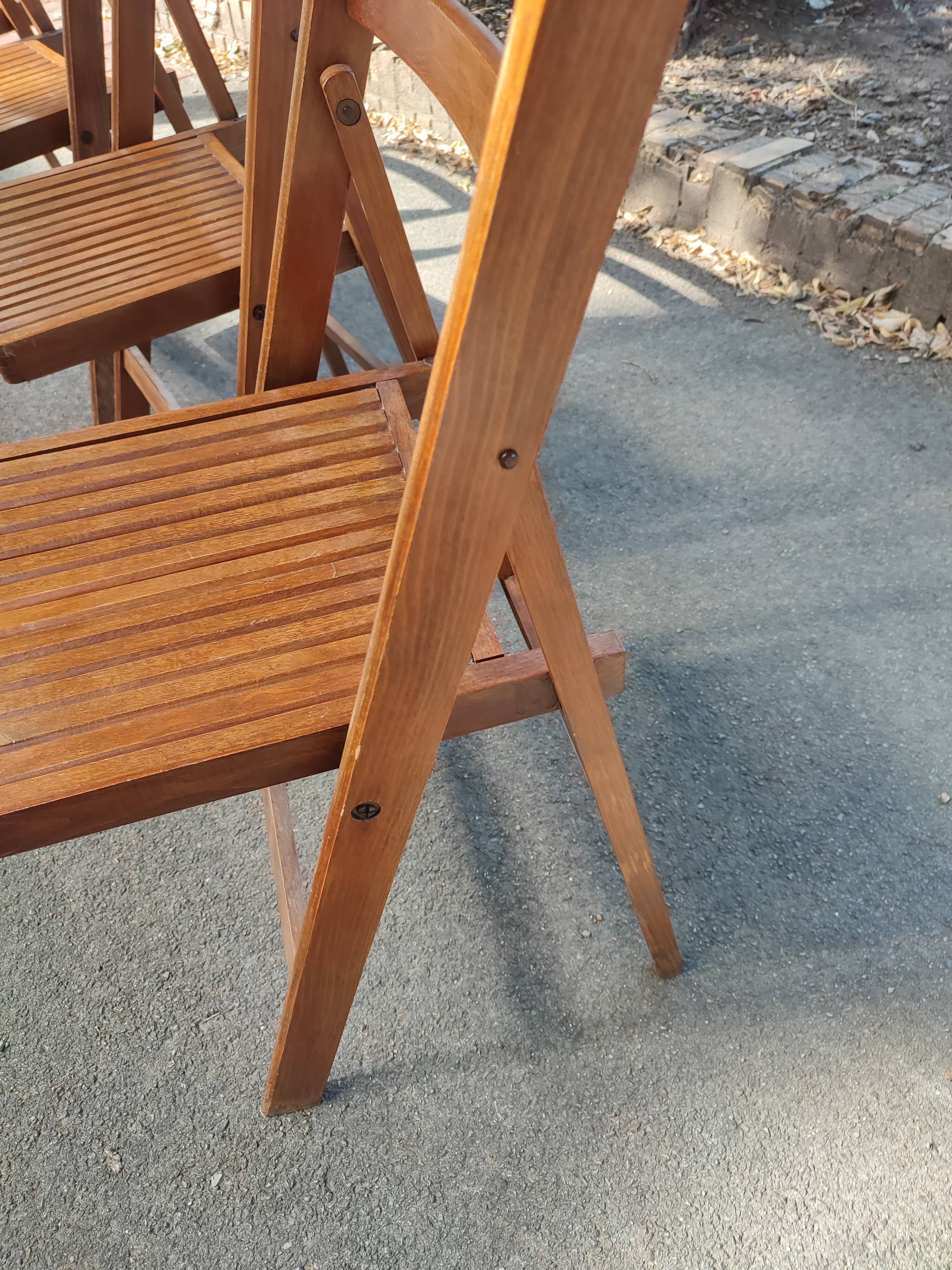 4 folding teak chairs