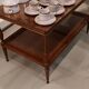 Coffee table / side table in mahogany with a rattan shelf.