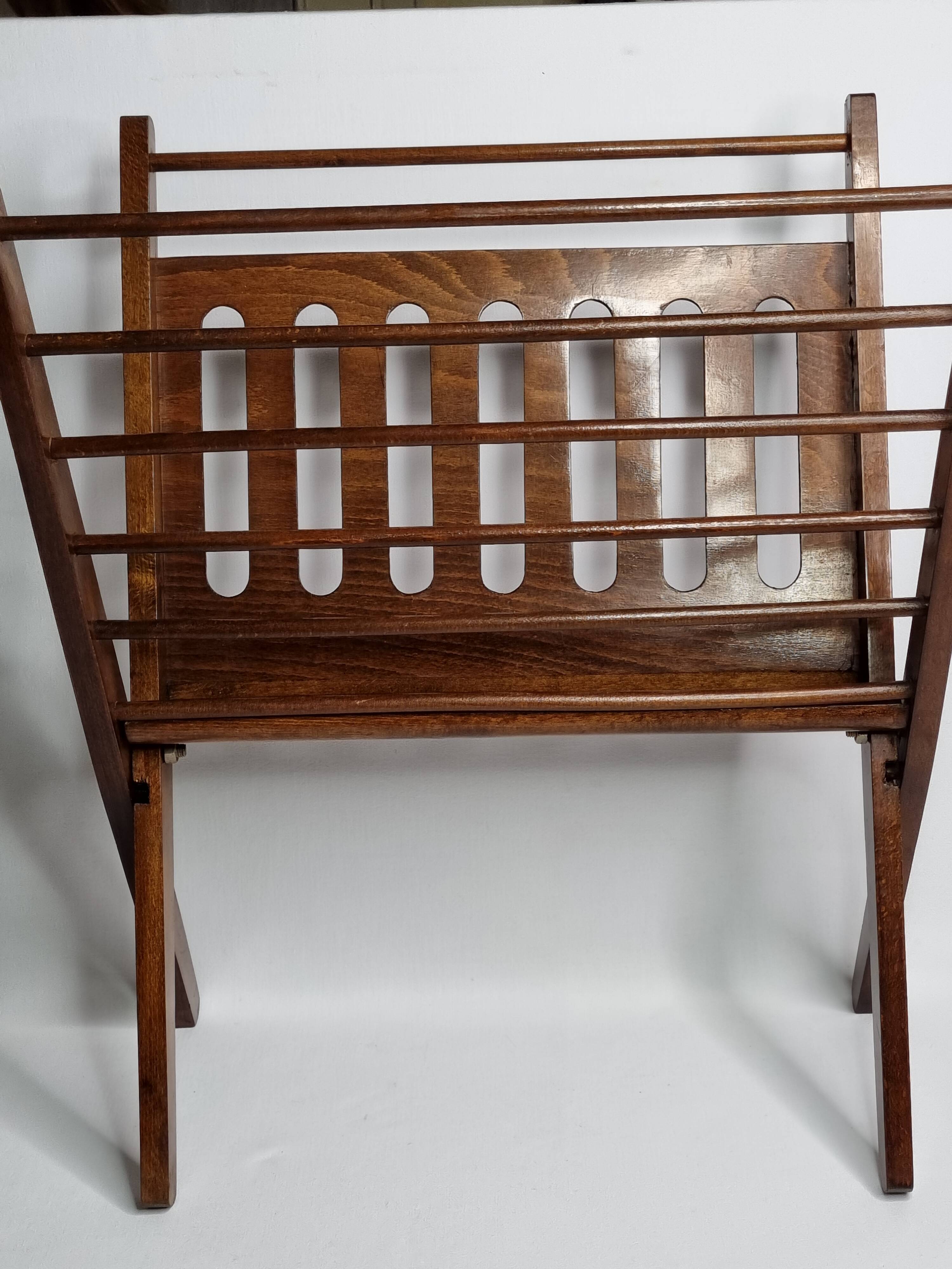 Folding teak magazine rack by Cees Braakman