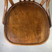 Baumann rotating wooden armchair