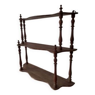 Turned wood wall shelf